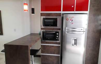 Imagem 6: Sobrado para venda tem 82 metros quadrados com 2 quartos em Centro - Garopaba - SC