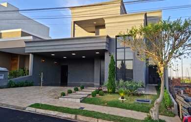 Imagem: A casa possui 3 Dormitórios, 5 Banheiros, 5 Vagas na garagem