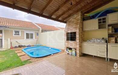 Imagem: A casa possui 2 Dormitórios, 1 Banheiro, 2 Vagas na garagem