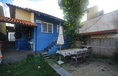 Imagem: A casa possui 3 Dormitórios, 3 Banheiros, 3 Vagas na garagem