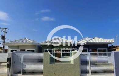 Imagem: A casa possui 3 Dormitórios, 1 Banheiro, 1 Vaga na garagem