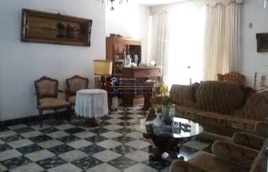 Imagem: A casa possui 4 Dormitórios, 5 Banheiros, 5 Vagas na garagem