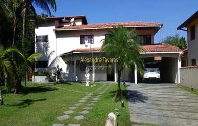 Imagem: A casa possui 5 Dormitórios, 5 Banheiros, 5 Vagas na garagem