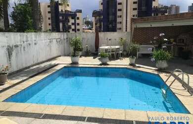 Imagem: A casa possui 4 Dormitórios, 5 Banheiros, 690m² de Área e