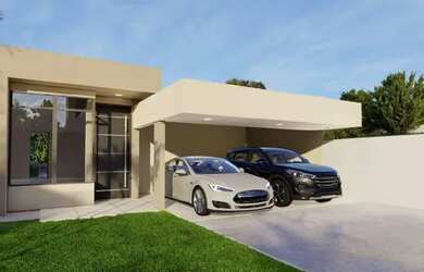 Imagem: A casa possui 3 Dormitórios, 2 Banheiros, 2 Vagas na garagem