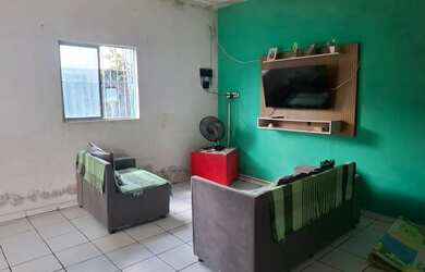 Imagem: A casa possui 2 Dormitórios, 1 Banheiro, 1 Vaga na garagem