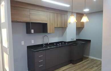 Imagem: O apartamento possui 2 Dormitórios, 1 Banheiro, 1 Vaga na garagem