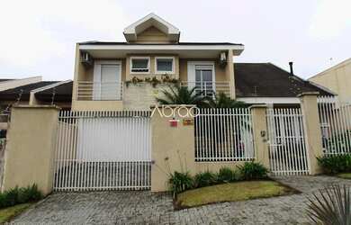 Imagem: A casa possui 4 Dormitórios, 5 Banheiros, 3 Vagas na garagem