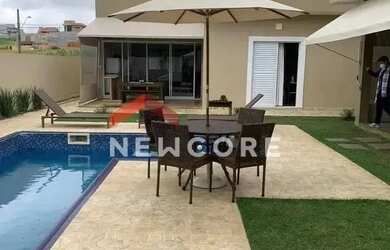 Imagem: A casa em condomínio possui 3 Dormitórios, 4 Banheiros, 4