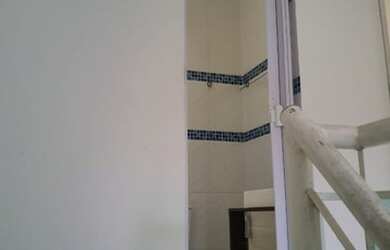 Imagem: A casa possui 2 Dormitórios, 3 Banheiros, 1 Vaga na garagem