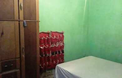 Imagem: A casa possui 2 Dormitórios, 2 Banheiros e está localizado