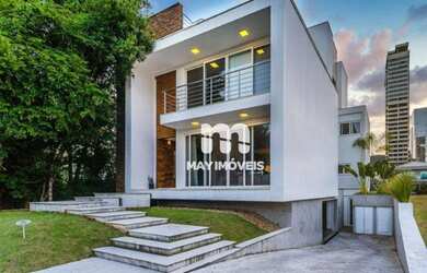 Imagem: A casa em condomínio possui 5 Dormitórios, 5 Banheiros, 5