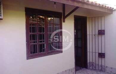 Imagem: A casa possui 2 Dormitórios, 1 Banheiro, 3 Vagas na garagem