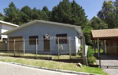 Imagem: A casa possui 3 Dormitórios, 1 Banheiro, 1 Vaga na garagem