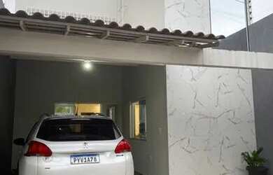 Imagem: A casa possui 4 Dormitórios, 5 Banheiros, 2 Vagas na garagem