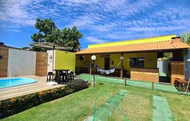 Imagem: A casa possui 2 Dormitórios, 2 Banheiros, 4 Vagas na garagem