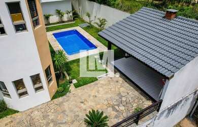 Imagem: A casa em condomínio possui 4 Dormitórios, 5 Banheiros, 5