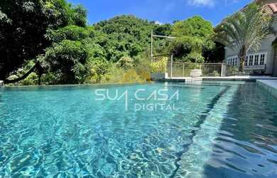 Imagem: A casa possui 5 Dormitórios, 5 Banheiros, 4 Vagas na garagem