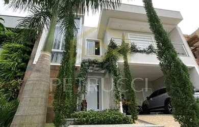 Imagem: A casa em condomínio possui 3 Dormitórios, 4 Banheiros, 4