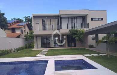 Imagem: A casa em condomínio possui 5 Dormitórios, 5 Banheiros, 3