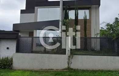 Imagem: A casa em condomínio possui 4 Dormitórios, 2 Banheiros, 4