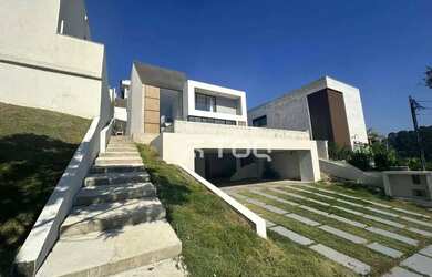 Imagem: A casa em condomínio possui 3 Dormitórios, 4 Banheiros, 5