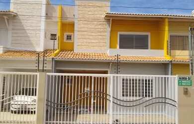 Imagem: A casa possui 3 Dormitórios, 2 Vagas na garagem, 125m² de