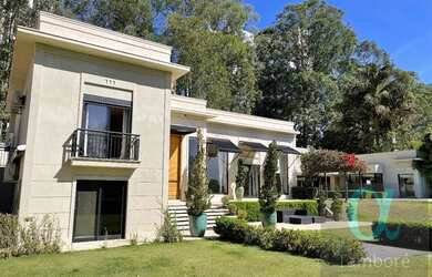 Imagem: A casa possui 4 Dormitórios, 5 Banheiros, 5 Vagas na garagem