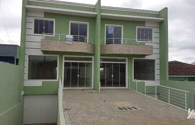 Imagem: A casa possui 2 Dormitórios, 4 Banheiros, 3 Vagas na garagem