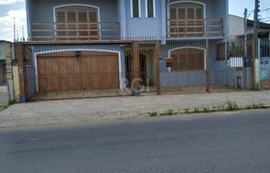 Imagem: A casa possui 5 Dormitórios, 5 Banheiros, 4 Vagas na garagem