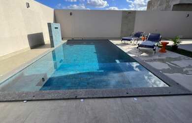 Imagem: A casa possui 2 Dormitórios, 1 Banheiro, 1 Vaga na garagem