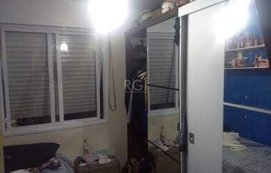 Imagem: O apartamento possui 3 Dormitórios, 1 Banheiro, 1 Vaga na garagem