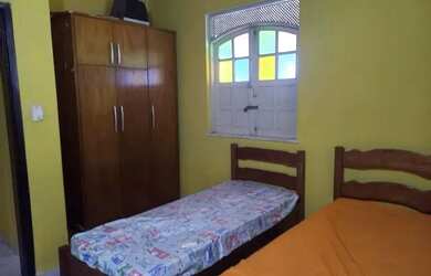 Imagem: A casa possui 3 Dormitórios, 5 Vagas na garagem e está localizado