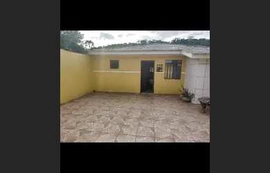 Imagem: A casa possui 4 Dormitórios, 1 Banheiro, 2 Vagas na garagem