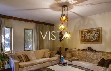 Imagem: A casa possui 5 Dormitórios, 4 Banheiros, 5 Vagas na garagem