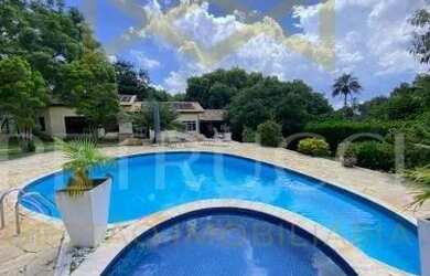 Imagem: A casa em condomínio possui 5 Dormitórios, 5 Banheiros, 5