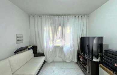 Imagem: A casa em condomínio possui 2 Dormitórios, 3 Banheiros, 2