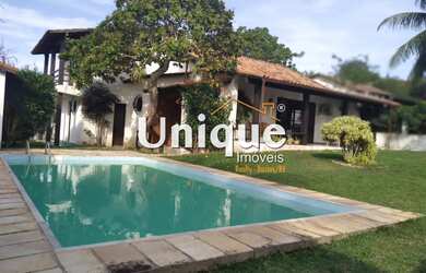 Imagem: A casa possui 5 Dormitórios, 4 Banheiros, 3 Vagas na garagem