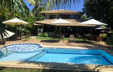 Imagem: A casa em condomínio possui 4 Dormitórios, 5 Banheiros, 4