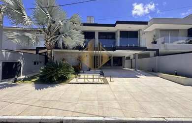 Imagem: A casa em condomínio possui 5 Dormitórios, 5 Banheiros, 4