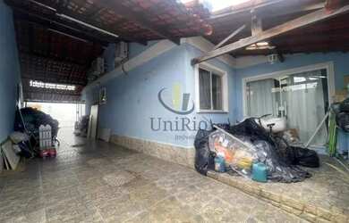 Imagem: A casa possui 2 Dormitórios, 2 Banheiros, 3 Vagas na garagem