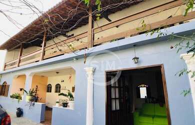 Imagem: A casa possui 3 Dormitórios, 1 Banheiro, 4 Vagas na garagem