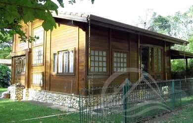 Imagem: A casa em condomínio possui 3 Dormitórios, 2 Banheiros, 5