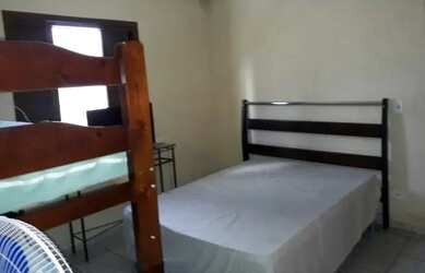 Imagem: A casa possui 2 Dormitórios, 2 Vagas na garagem e está localizado