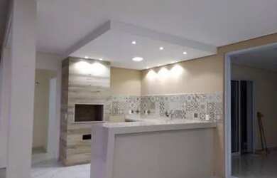 Imagem: A casa possui 4 Dormitórios, 5 Banheiros, 4 Vagas na garagem