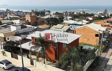 Imagem: A casa possui 3 Dormitórios, 3 Banheiros, 2 Vagas na garagem