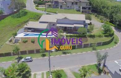 Imagem: A casa em condomínio possui 4 Dormitórios, 2 Banheiros, 5