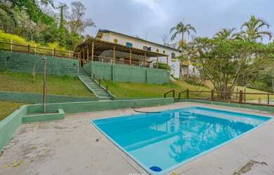 Imagem: A casa em condomínio possui 3 Dormitórios, 4 Banheiros, 5