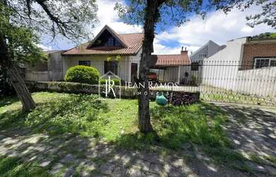 Imagem: A casa possui 3 Dormitórios, 3 Banheiros, 2 Vagas na garagem