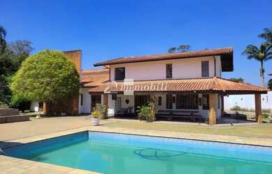 Imagem: A casa em condomínio possui 5 Dormitórios, 5 Banheiros, 5